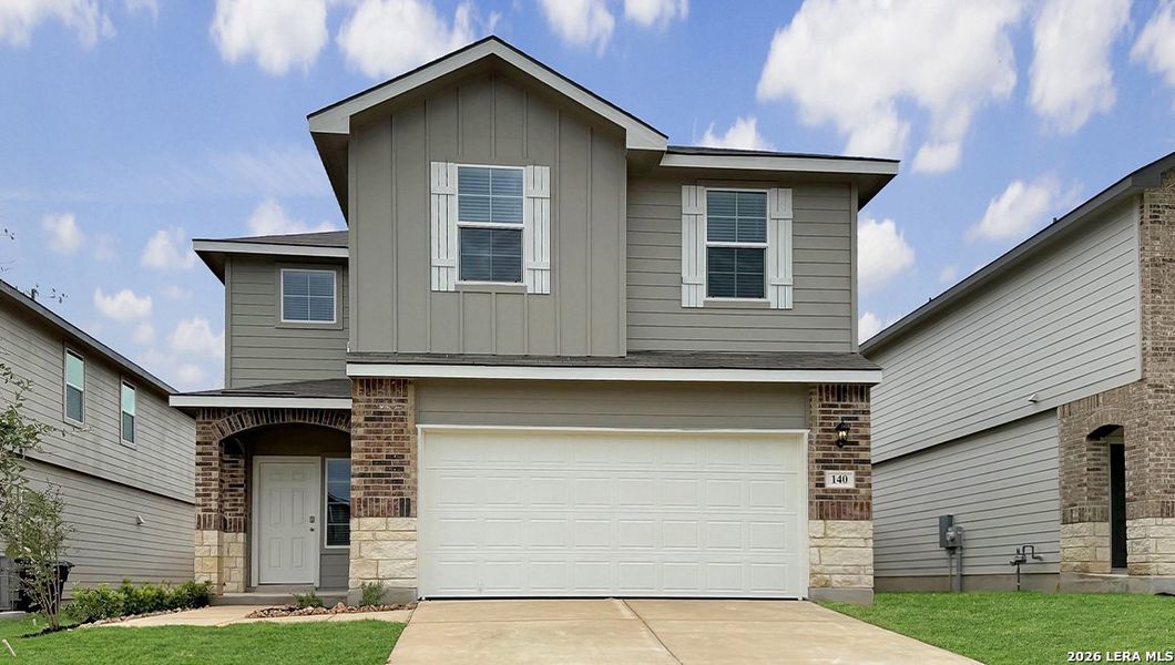 Front exterior of a new home in Redbird Ranch, San Antonio, TX, highlighting curb appeal (Image 1). Front exterior of a new home in Redbird Ranch, San Antonio, TX, highlighting curb appeal (Image 1).
