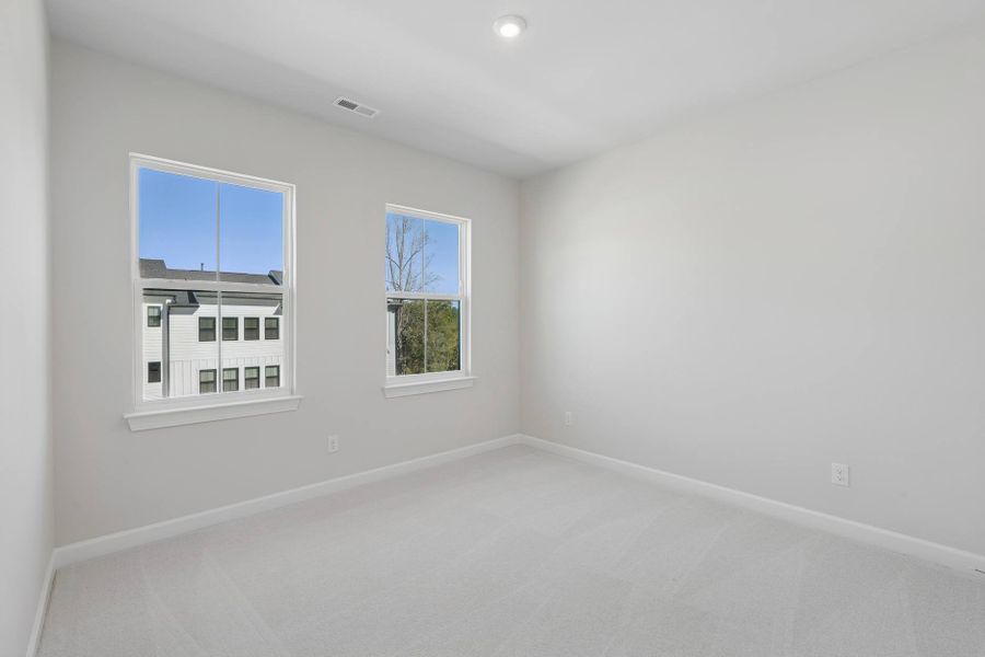 Representative unfurnished interior of a home built from the Kinston by Tri Pointe Homes in Elm Park, Raleigh (Image 20).
