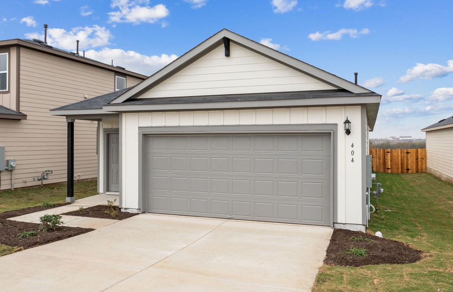 Front exterior of a new home in Larson Crossing, Elgin, TX, highlighting curb appeal (Image 18).