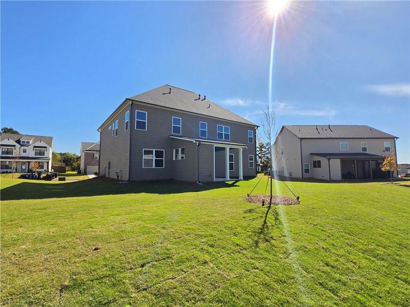 Exterior details and patio area of a home in Enclave at Logan Point, Loganville (Image 4).