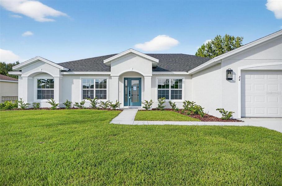 Front exterior of a new home in , Palm Coast, FL, highlighting curb appeal (Image 27).