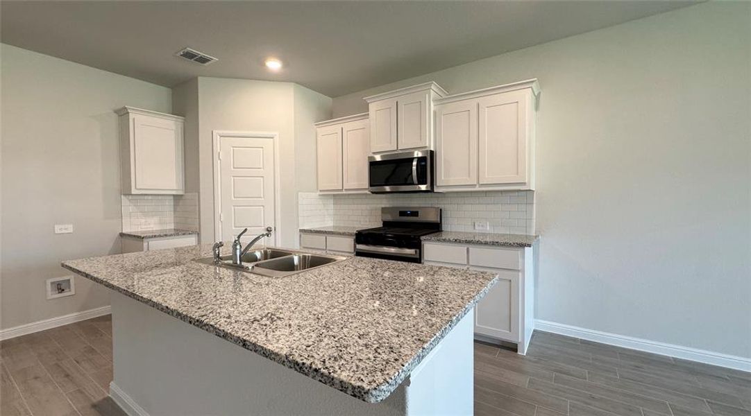 Furnished interior view inside a new home in The Canyons, Keene (Image 6).
