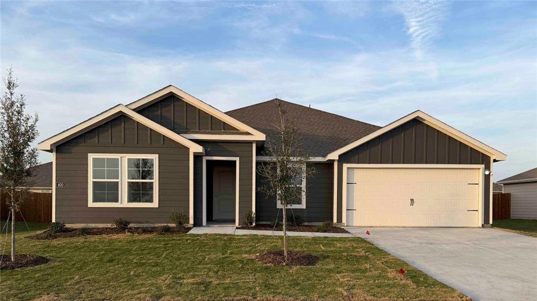 Front exterior of a new home in Waverly Estates, Josephine, TX, highlighting curb appeal (Image 1). Front exterior of a new home in Waverly Estates, Josephine, TX, highlighting curb appeal (Image 1).