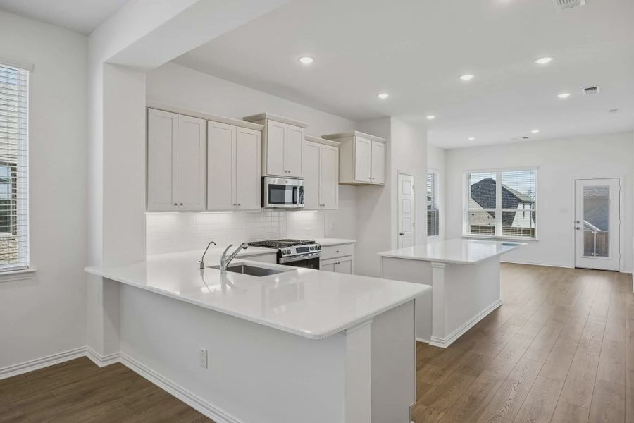 Furnished interior view inside a new home in Bel Air Village, Sherman (Image 3). Furnished interior view inside a new home in Bel Air Village, Sherman (Image 3).