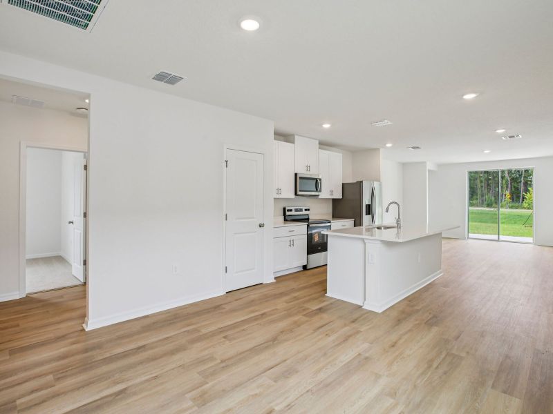 The Great Room of the Acadia at 7521 Mia Vine Dr.