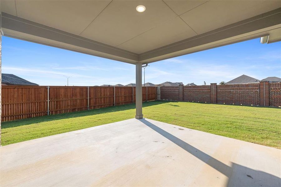 Exterior details and patio area of a home in Northstar, Haslet (Image 18).