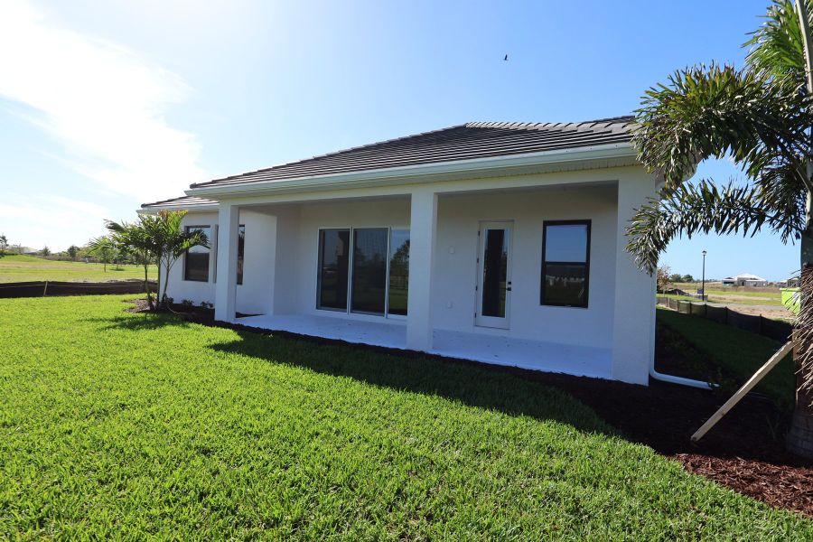 Exterior details and patio area of a home in Palmera Wellen Park - Classic Series, Venice (Image 3).