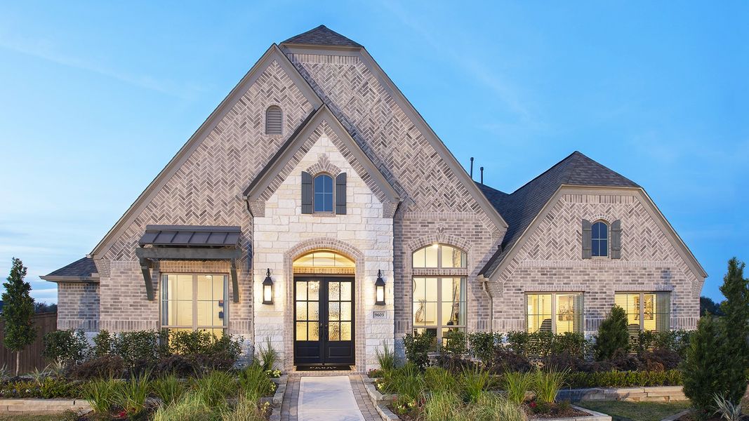 Representative exterior photo of a completed home built from the 3578W by Perry Homes in Lakes of Cane Island, Katy, TX (Image 25).