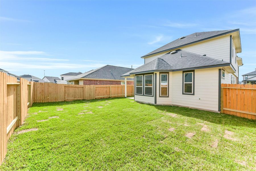 Exterior details and patio area of a home in , Houston (Image 2). Exterior details and patio area of a home in , Houston (Image 2).