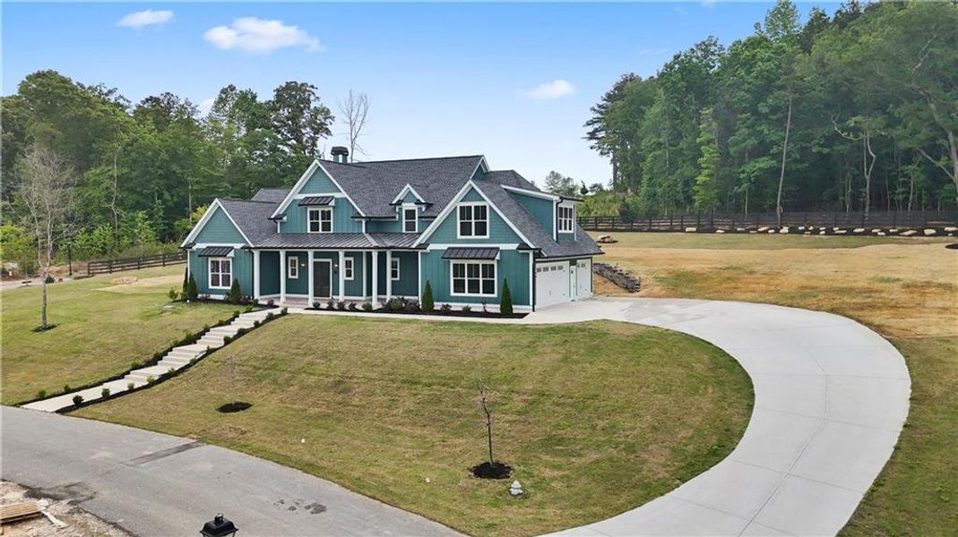 Front exterior of a new home in , Dacula, GA, highlighting curb appeal (Image 28).