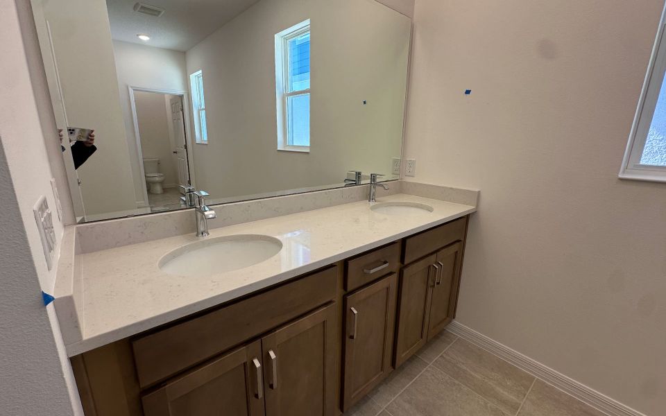 Modern Primary Bathroom with Stylish Features in Central Florida House