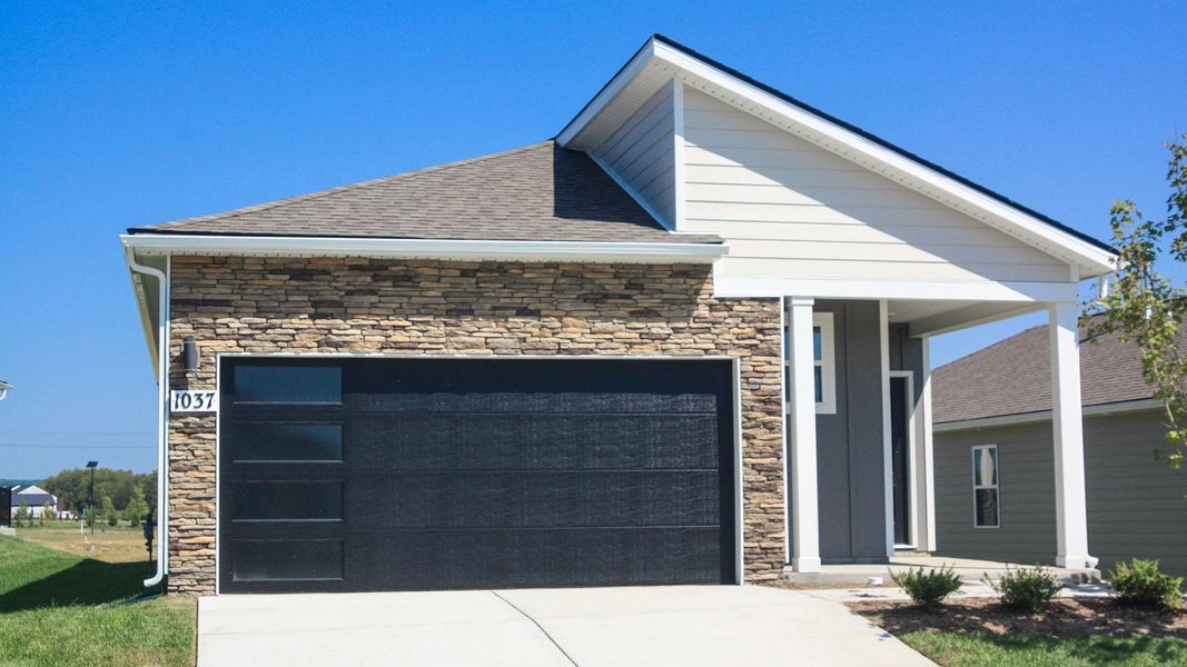 Front exterior of a new home in Nexus South, Gallatin, TN, highlighting curb appeal (Image 2).
