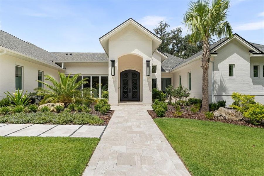 Front exterior of a new home in , Gainesville, FL, highlighting curb appeal (Image 24).