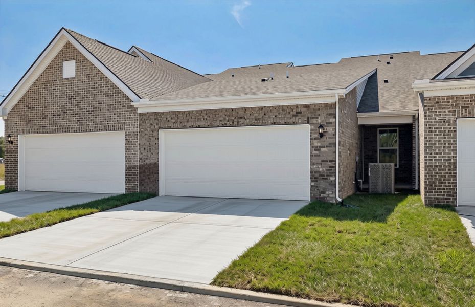 Front exterior of a new home in Bradshaw Farms Reserve, Mount Juliet, TN, highlighting curb appeal (Image 2). Front exterior of a new home in Bradshaw Farms Reserve, Mount Juliet, TN, highlighting curb appeal (Image 2).