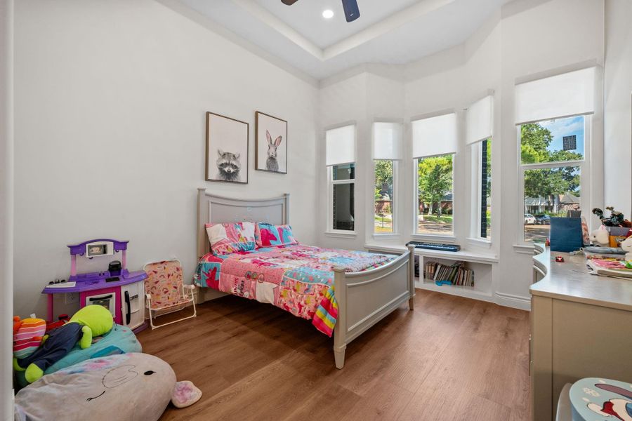 Spacious third bedroom with lots of natural light.