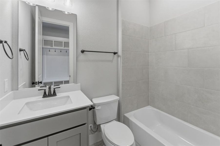 Bathroom with vanity and shower / bathtub combination