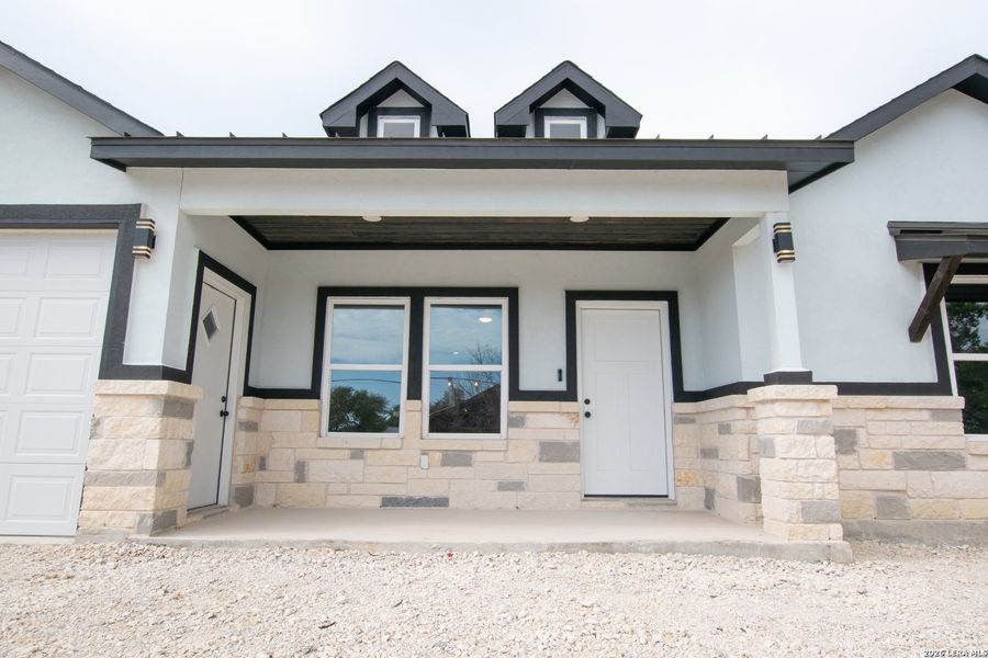 Exterior details and patio area of a home in , Spring Branch (Image 3). Exterior details and patio area of a home in , Spring Branch (Image 3).