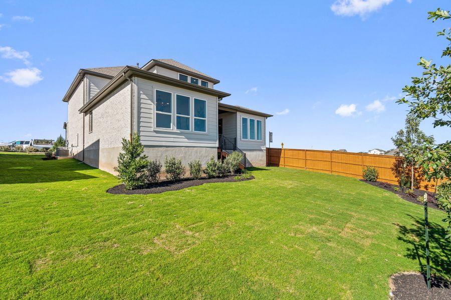 Exterior details and patio area of a home in Lagos Reserve, Manor (Image 25).