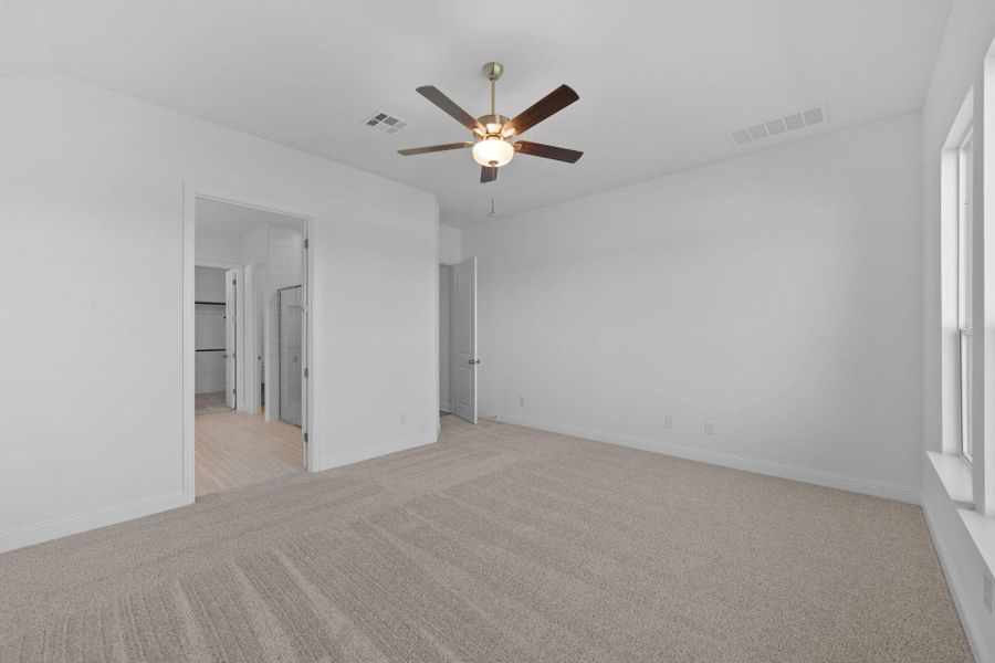 Primary Bedroom with elevated ceiling