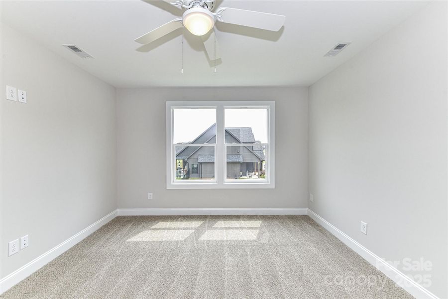Secondary Bedroom on upper level with ceiling fan/light! Secondary Bedroom on upper level with ceiling fan/light!