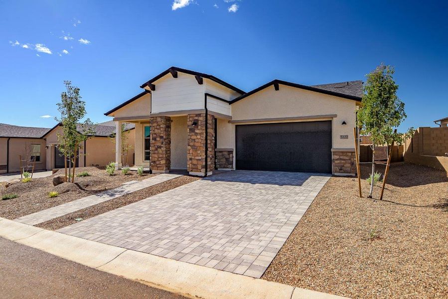 Front exterior of a new home in Horizon at The Dells, Prescott, AZ, highlighting curb appeal (Image 24).