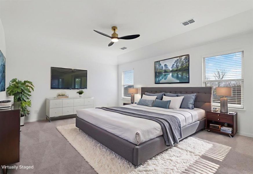 Bedroom featuring carpet floors and ceiling fan