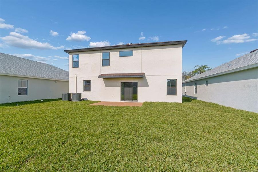 Exterior details and patio area of a home in Avalon West, Spring Hill (Image 4).