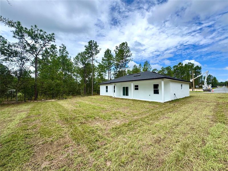 Front exterior of a new home in , Citrus Springs, FL, highlighting curb appeal (Image 19). Front exterior of a new home in , Citrus Springs, FL, highlighting curb appeal (Image 19).