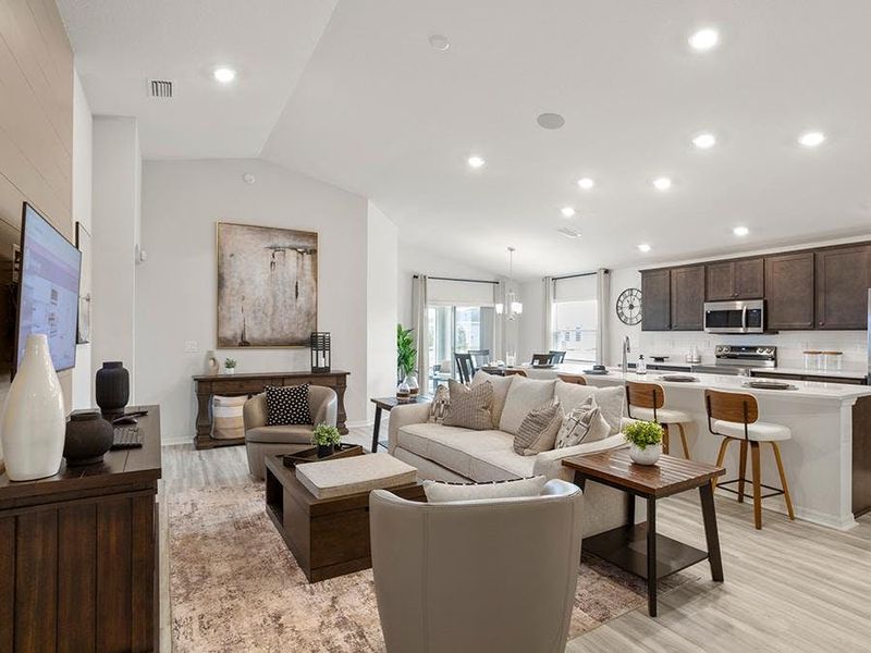 This popular 1,715 sq. ft. home plan includes a sunny open-concept layout - Parker by Highland Homes