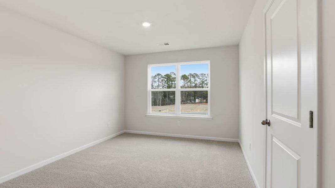Spacious, unfurnished interior of a new home in Waverly Station, Greenwood (Image 31).