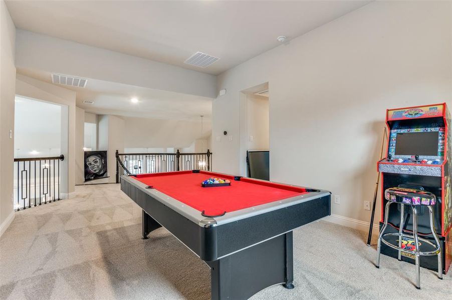 Recreation room with pool table, light carpet, and recessed lighting