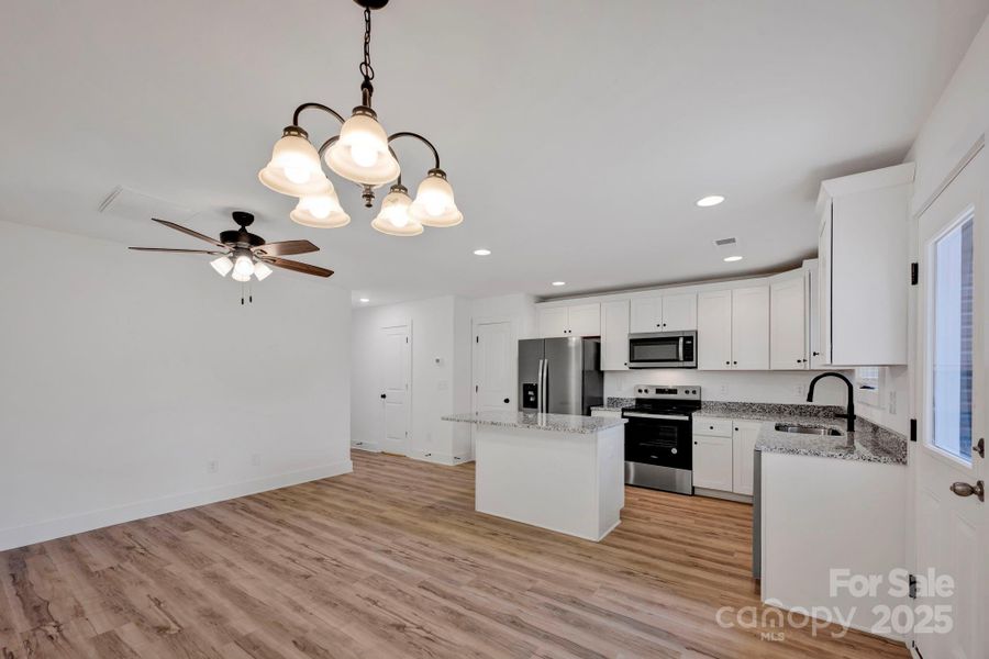Furnished interior view inside a new home in , Concord (Image 8).