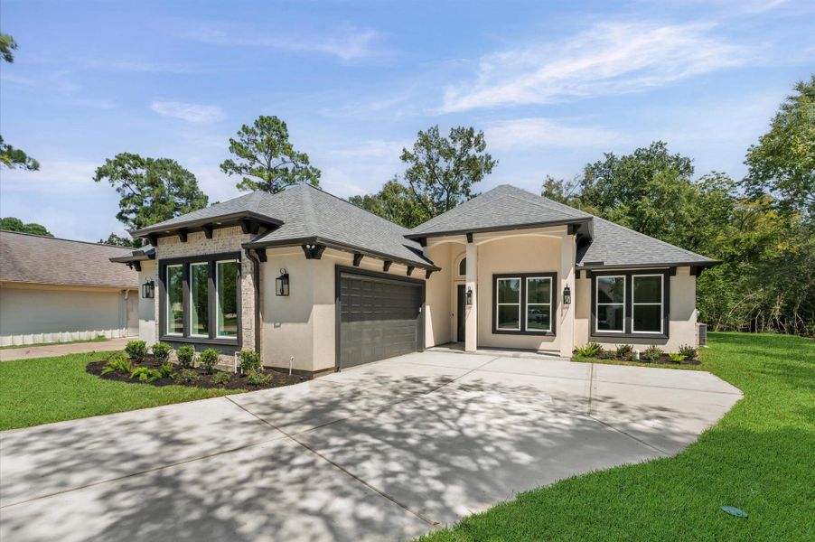 Front exterior of a new home in , Montgomery, TX, highlighting curb appeal (Image 1). Front exterior of a new home in , Montgomery, TX, highlighting curb appeal (Image 1).