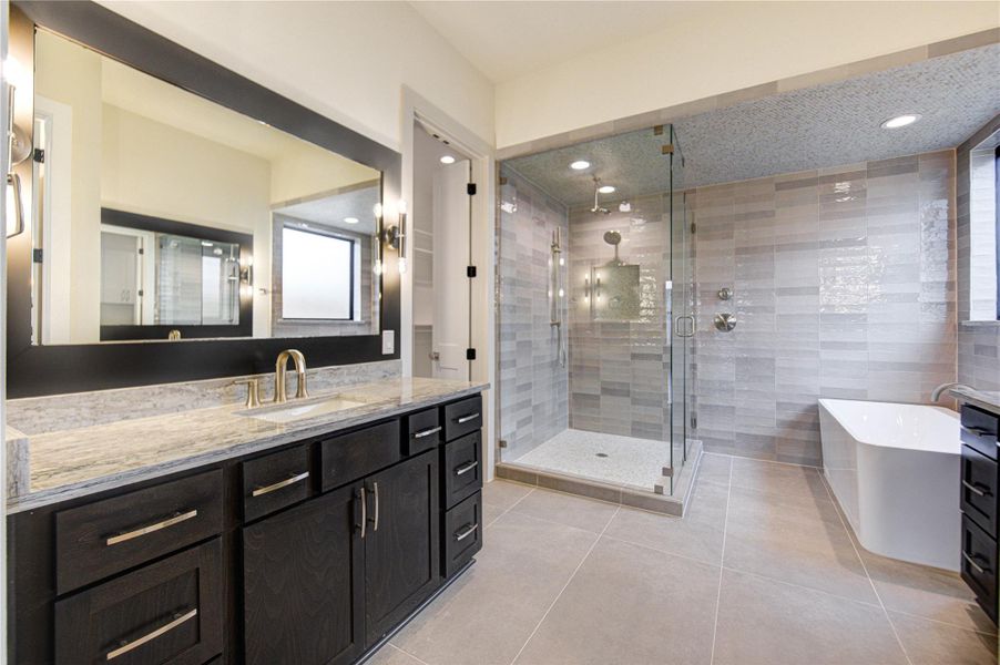 The primary bathroom is spacious with lots of storage The primary bathroom is spacious with lots of storage