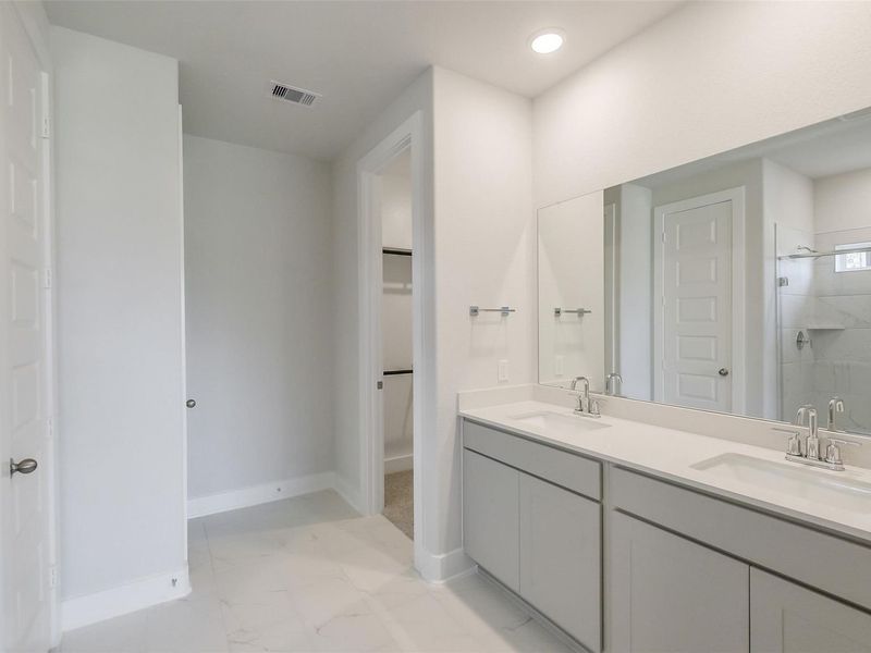 Furnished interior view inside a new home in Sunterra, Katy (Image 7).