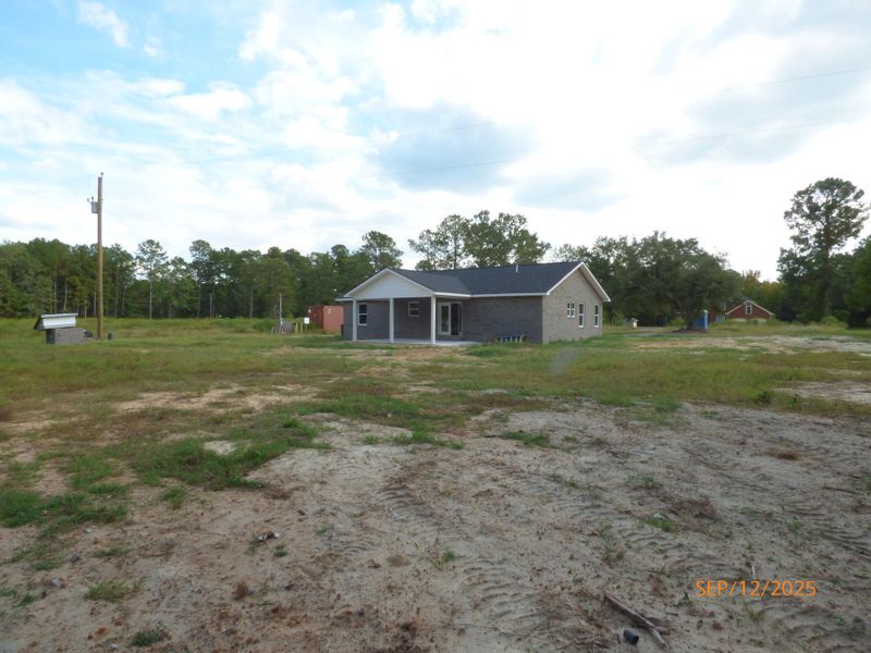 Front exterior of a new home in , Pineville, SC, highlighting curb appeal (Image 2). Front exterior of a new home in , Pineville, SC, highlighting curb appeal (Image 2).