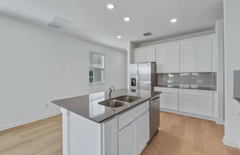Furnished interior view inside a new home in Sunfield, Buda (Image 8).