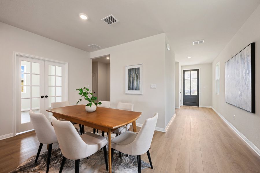 Representative furnished interior of a home built from the Granbury by Ashton Woods in The Trails at Carmel, Pflugerville (Image 9).