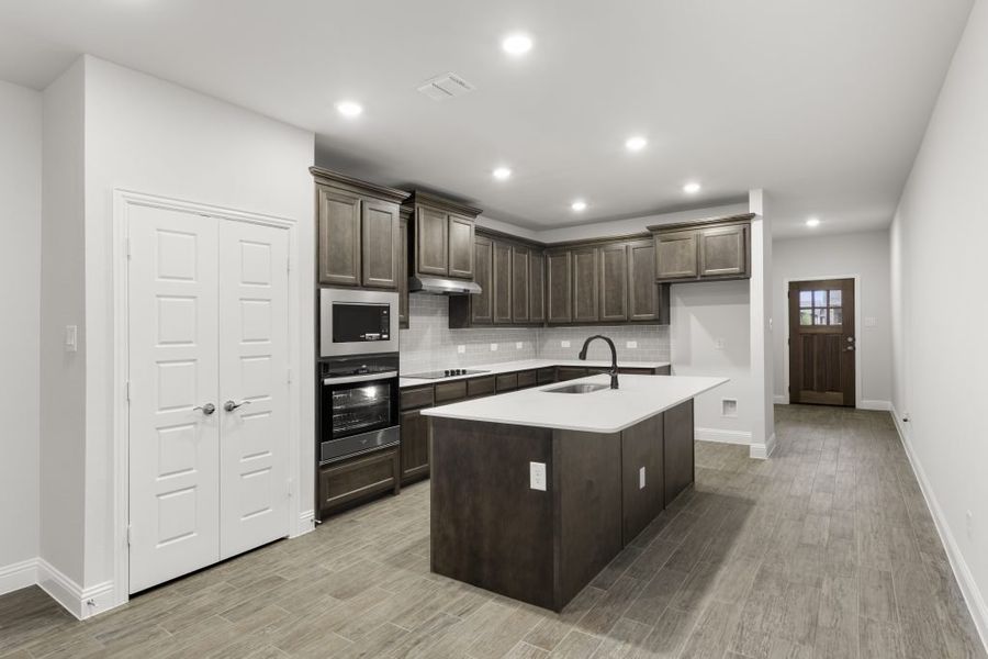 Front exterior of a new home in Redden Farms – Active Adult, Midlothian, TX, highlighting curb appeal (Image 8).