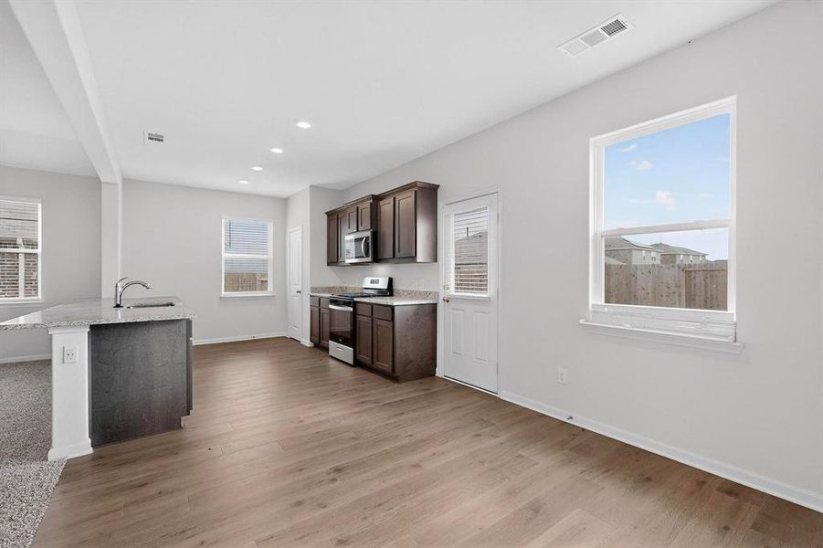 Furnished interior view inside a new home in Patriot Estates, Venus (Image 11).