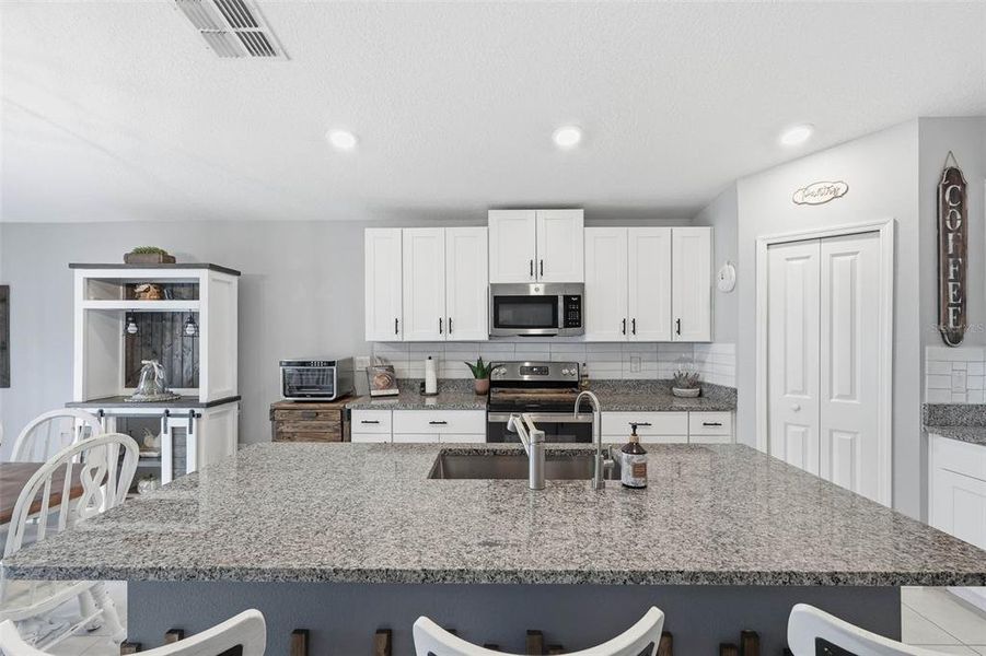 Furnished interior view inside a new home in Verano: The Estates, Spring Hill (Image 5). Furnished interior view inside a new home in Verano: The Estates, Spring Hill (Image 5).