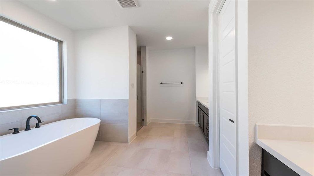 Furnished interior view inside a new home in Somerset Park 80', Rockwall (Image 13).