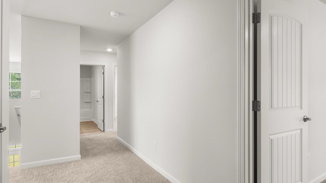 Representative unfurnished interior of a home built from the Elle by D.R. Horton in Fairway 17 at Mirror Lake, Villa Rica (Image 44). Representative unfurnished interior of a home built from the Elle by D.R. Horton in Fairway 17 at Mirror Lake, Villa Rica (Image 44).