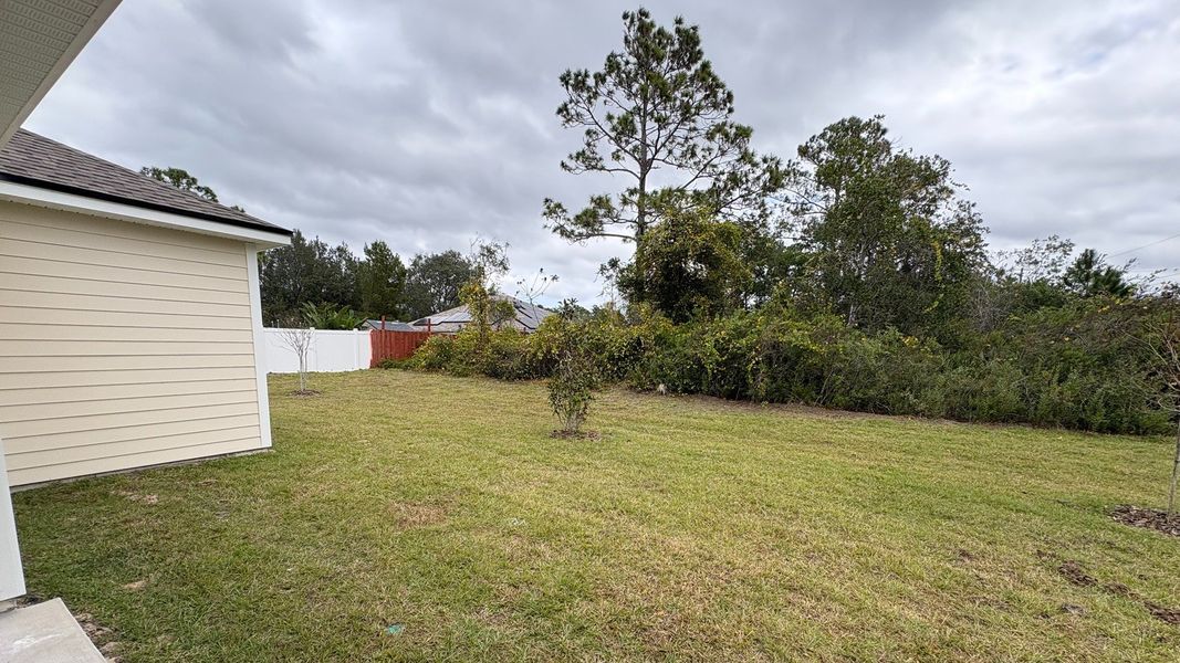 Exterior details and patio area of a home in Palm Coast, Palm Coast (Image 2). Exterior details and patio area of a home in Palm Coast, Palm Coast (Image 2).