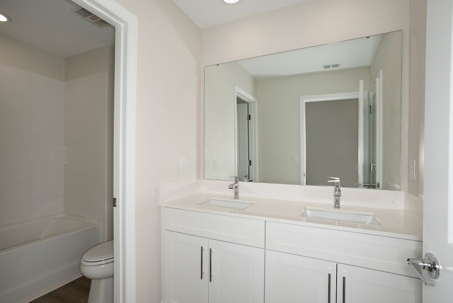 Furnished interior view inside a new home in Pasadena Woods, Dade City (Image 11).