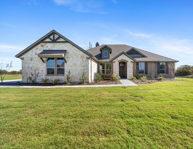 Front exterior of a new home in Parker Heights, Valley View, TX, highlighting curb appeal (Image 1). Front exterior of a new home in Parker Heights, Valley View, TX, highlighting curb appeal (Image 1).