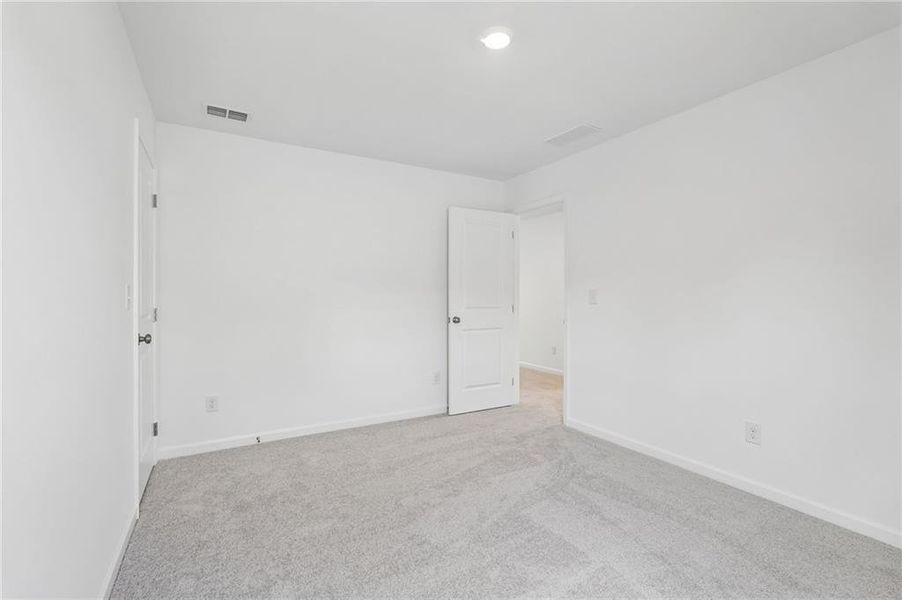 Spacious, unfurnished interior of a new home in Heritage River, Euharlee (Image 22).