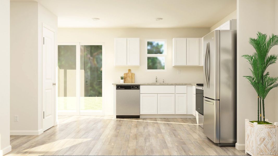 A kitchen with white cabinets. A kitchen with white cabinets.
