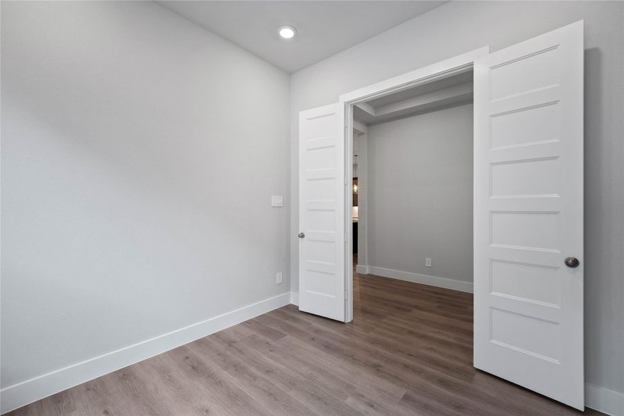 The study/home office is a bright, flexible living space with a strong emphasis on natural light and an open yet defined floor plan, highlighted by the use of double doors.