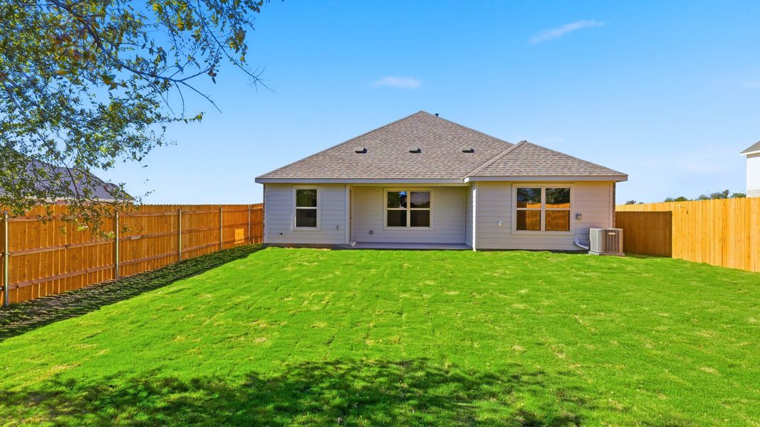 Exterior details and patio area of a home in Creeks Crossing, Elgin (Image 3).